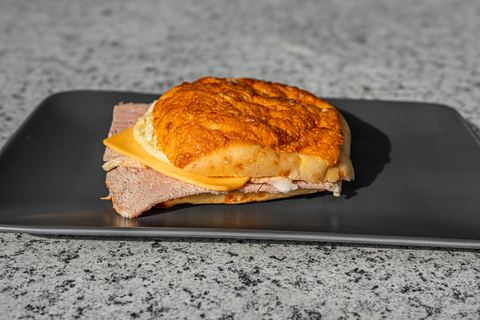 Breakfast Loaded Bun with Ham, Egg and Cheese